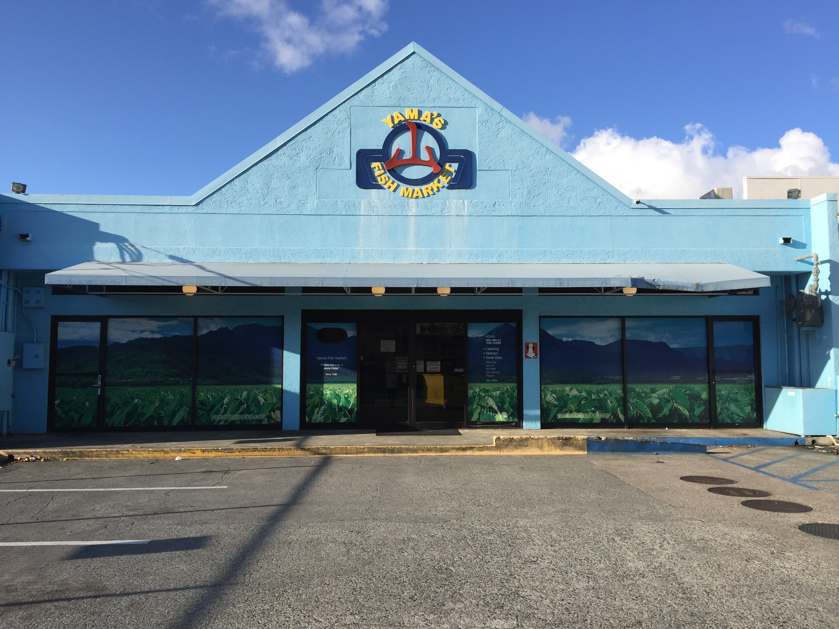 a sign in front of a building